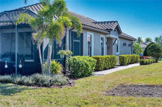 view of home's exterior featuring a yard