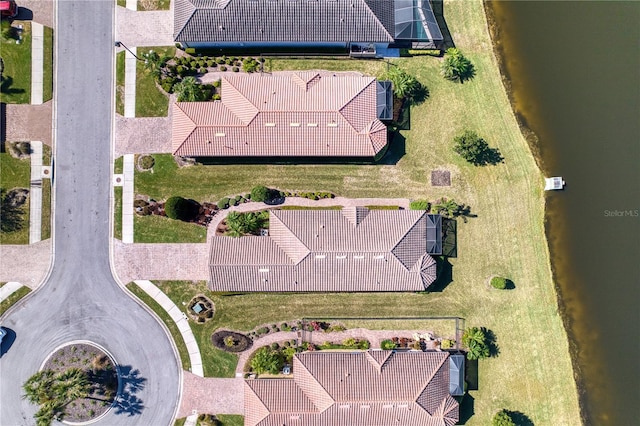 drone / aerial view featuring a water view