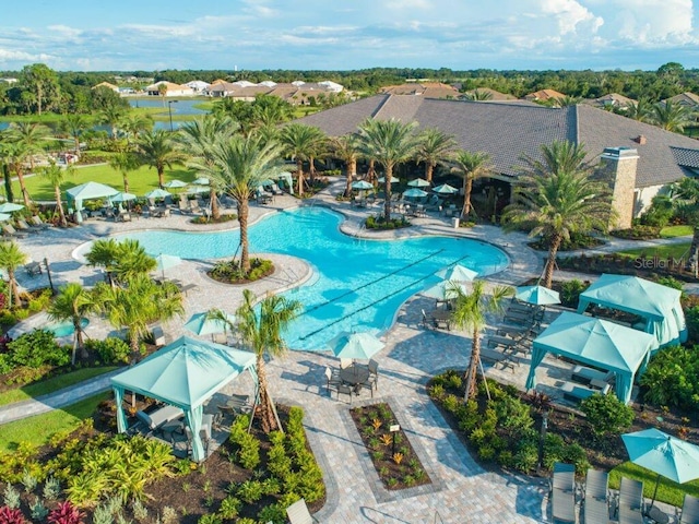 view of swimming pool with a gazebo and a patio