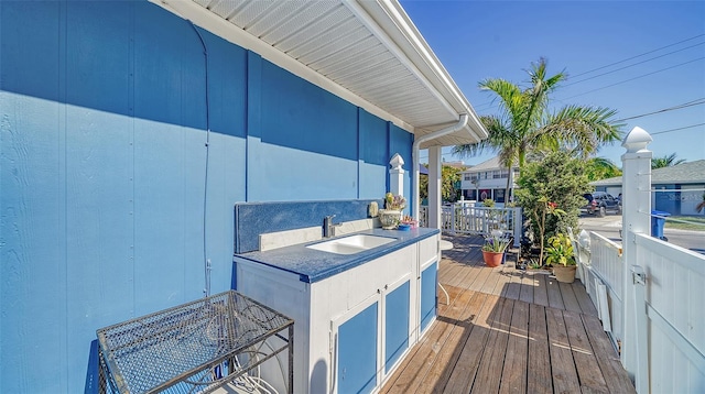 wooden deck with sink