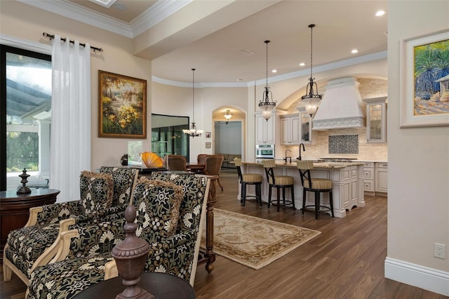 dining space featuring crown molding and dark hardwood / wood-style floors