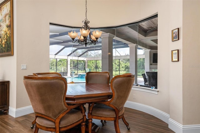 dining room with plenty of natural light and hardwood / wood-style floors