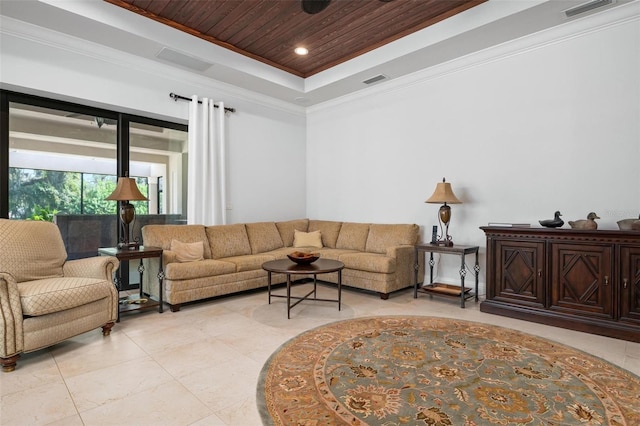 living room featuring ornamental molding, wooden ceiling, and a raised ceiling