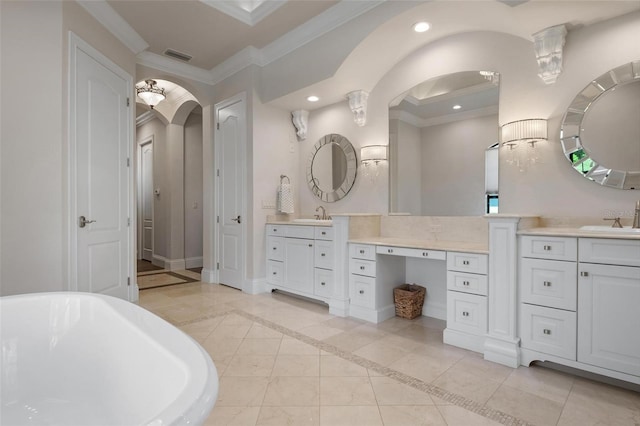 bathroom with crown molding, vanity, and a tub to relax in