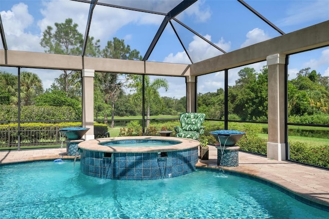 view of swimming pool featuring an in ground hot tub, pool water feature, and a lanai