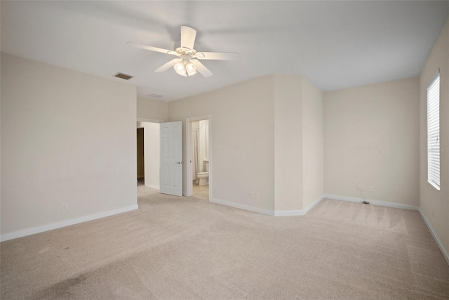 carpeted empty room with ceiling fan