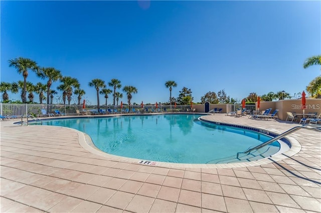 view of swimming pool featuring a patio