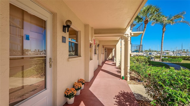 view of patio featuring a balcony