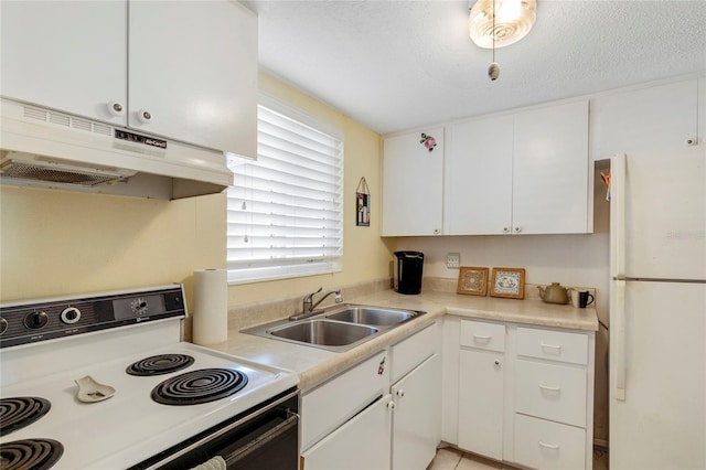 kitchen with sink, white cabinetry, a textured ceiling, white fridge, and electric stove