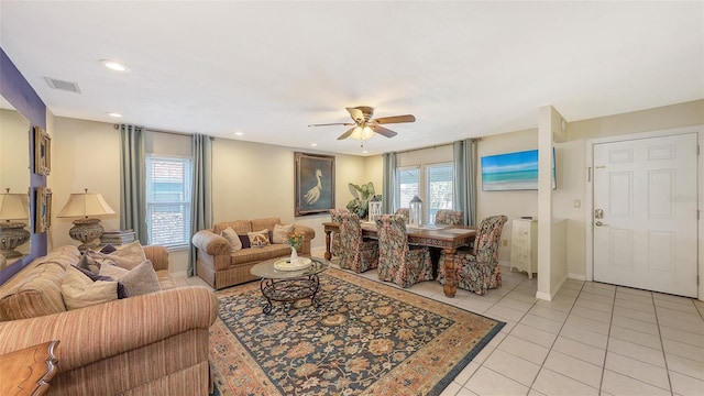 tiled living room featuring ceiling fan