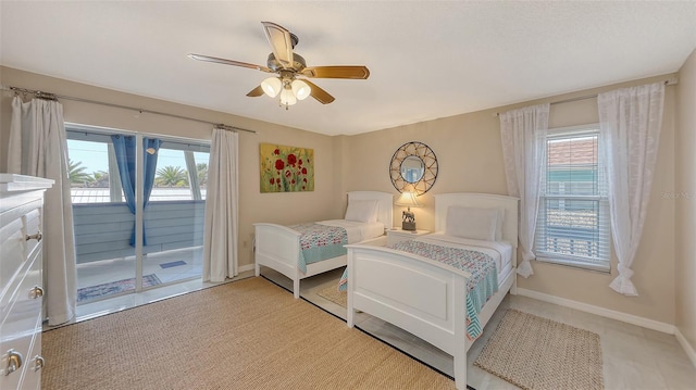 bedroom featuring ceiling fan and access to outside