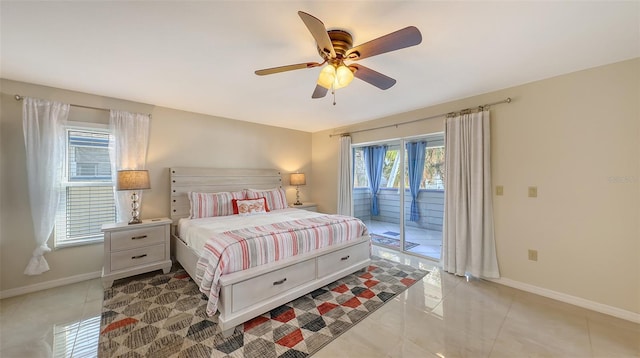 tiled bedroom with ceiling fan and access to outside