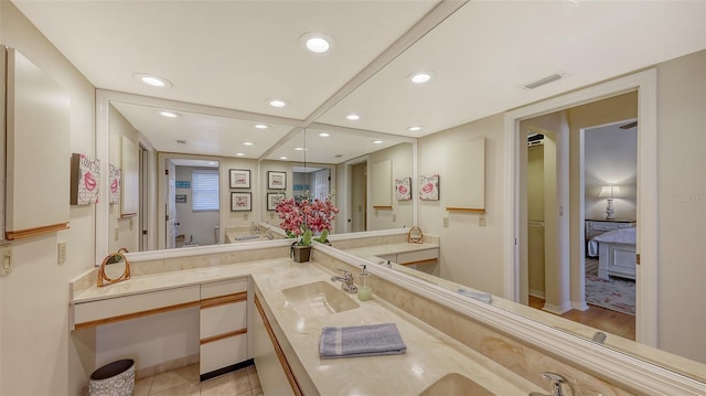 bathroom featuring vanity and tile patterned flooring