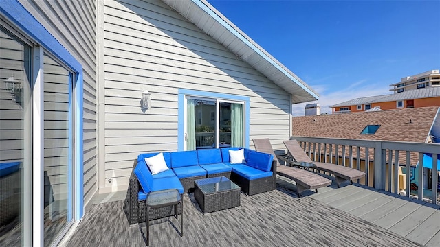 wooden terrace featuring an outdoor living space