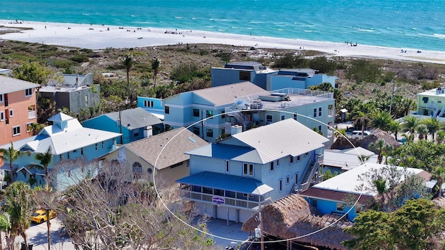 aerial view with a view of the beach and a water view