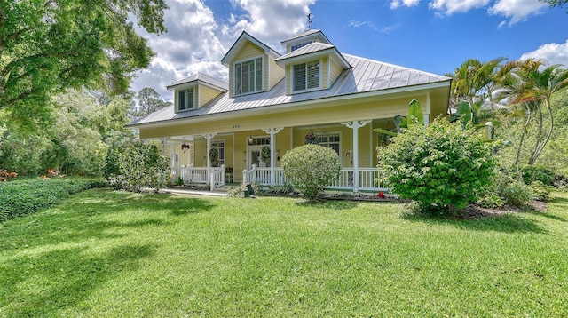 view of front of house featuring a front lawn and a porch