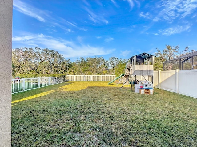 view of yard with a playground