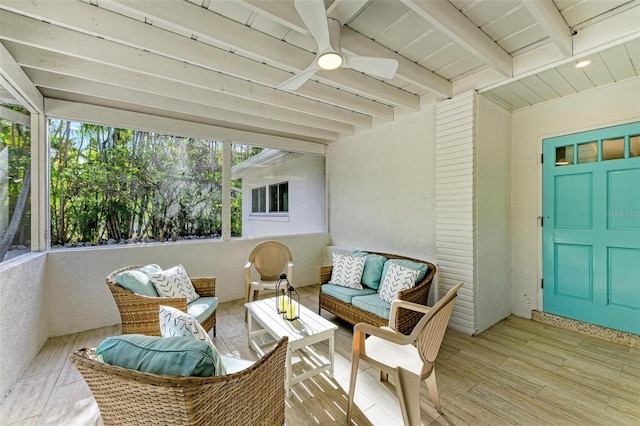 exterior space featuring an outdoor living space and ceiling fan