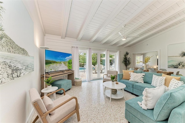 sunroom / solarium with lofted ceiling with beams, french doors, and wooden ceiling