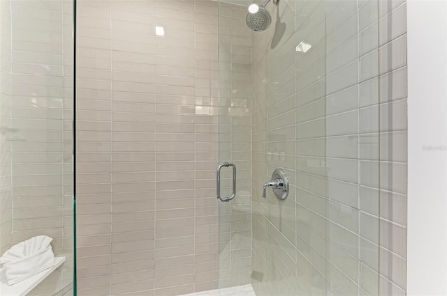 bathroom featuring an enclosed shower