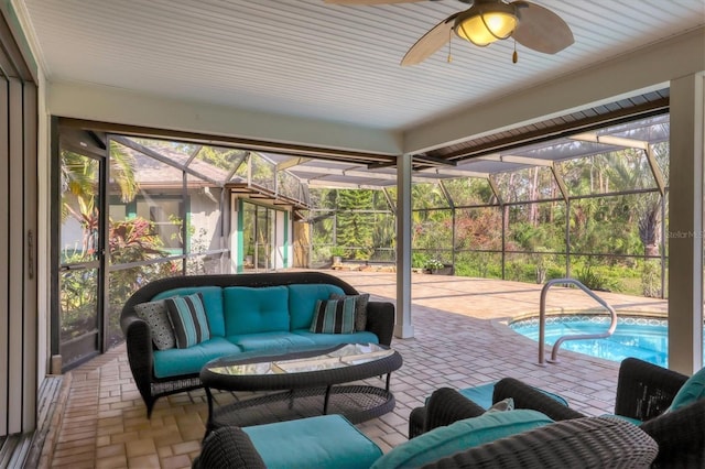 sunroom / solarium with ceiling fan