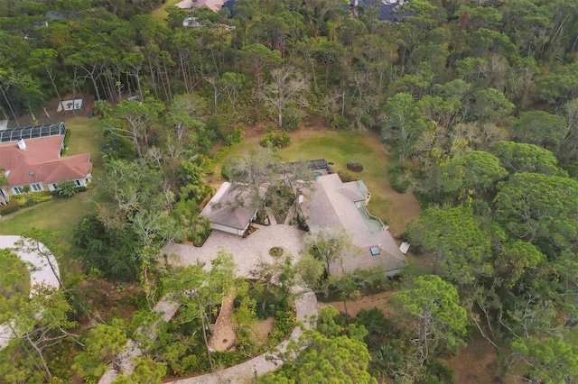 aerial view featuring a view of trees