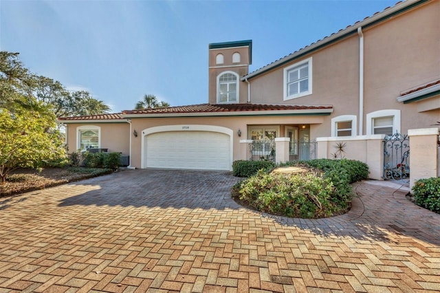 view of front of property with a garage