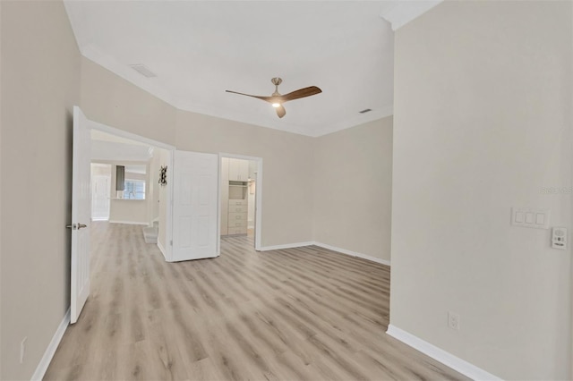 spare room featuring ceiling fan and light hardwood / wood-style floors