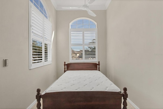 bedroom with crown molding and ceiling fan