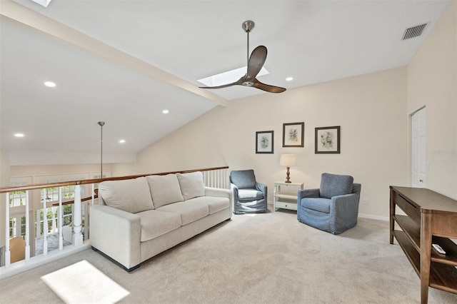1719 Starling Dr Unit 1719, Sarasota, FL 34231 - living room with a ceiling fan, light carpet, recessed lighting, a skylight, and vaulted ceiling