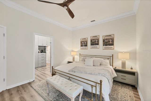 1719 Starling Dr Unit 1719, Sarasota, FL 34231 - bedroom featuring crown molding, light wood-style floors, and ceiling fan