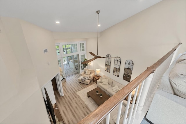 1719 Starling Dr Unit 1719, Sarasota, FL 34231 - stairway featuring recessed lighting and wood finished floors