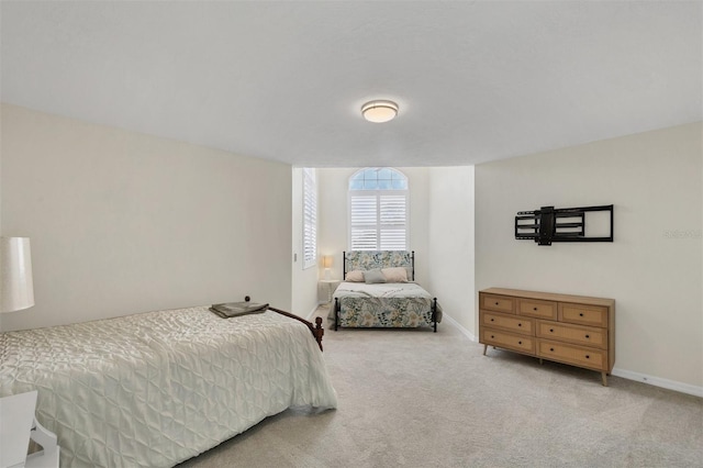 1719 Starling Dr Unit 1719, Sarasota, FL 34231 - carpeted bedroom featuring baseboards