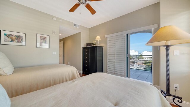 bedroom with access to exterior, ceiling fan, visible vents, and baseboards