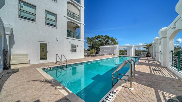 pool with a patio