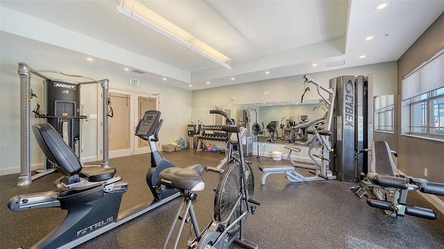 workout area with recessed lighting and baseboards