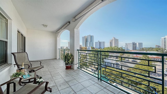 balcony featuring a city view