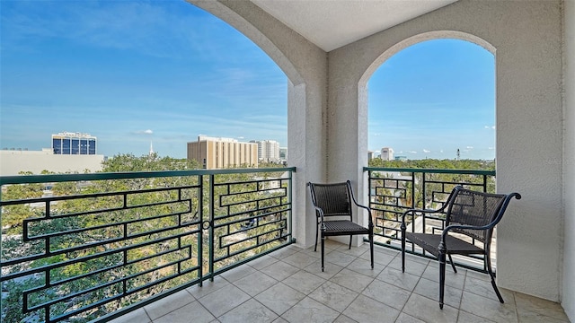 balcony featuring a view of city