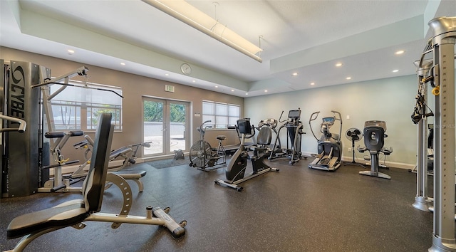 workout area with baseboards, french doors, and recessed lighting