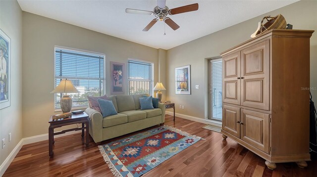 505 S Orange Ave Unit 501, Sarasota, FL 34236 - living area featuring a ceiling fan, baseboards, and dark wood-style floors