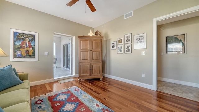 505 S Orange Ave Unit 501, Sarasota, FL 34236 - foyer featuring a ceiling fan, light wood-type flooring, and baseboards