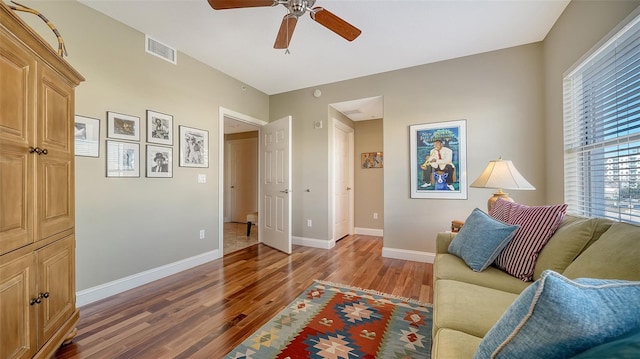 505 S Orange Ave Unit 501, Sarasota, FL 34236 - living room featuring wood finished floors, ceiling fan, and baseboards