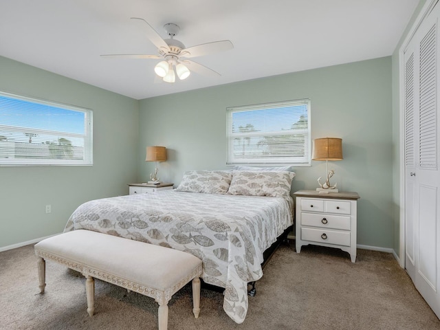 5303 Coral Blvd, Bradenton, FL 34210 - bedroom with a ceiling fan, baseboards, a closet, and carpet floors