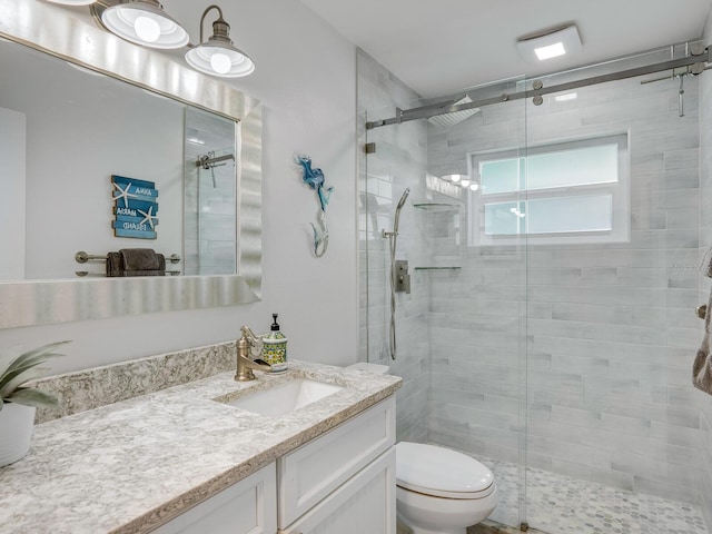 5303 Coral Blvd, Bradenton, FL 34210 - full bath featuring vanity, a shower stall, and toilet