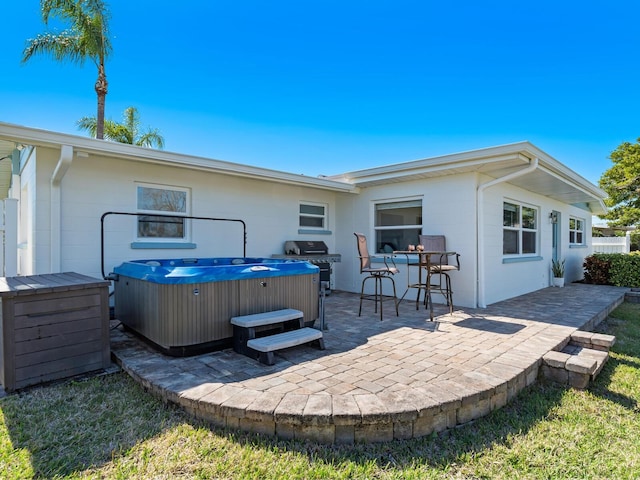 5303 Coral Blvd, Bradenton, FL 34210 - back of house with a patio and a hot tub