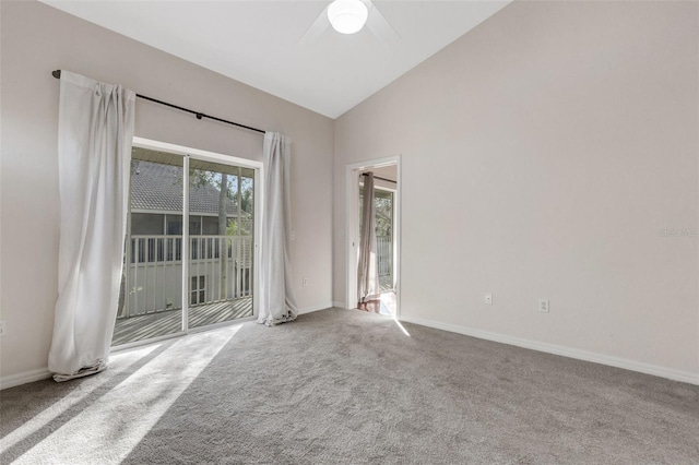 spare room featuring ceiling fan, high vaulted ceiling, and carpet floors