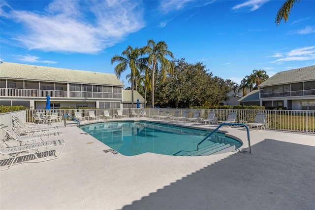 view of pool featuring a patio