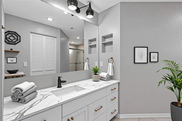 6706 Fairway Gardens Dr Unit 6706, Bradenton, FL 34203 - bathroom featuring vanity, an enclosed shower, recessed lighting, and tile patterned floors