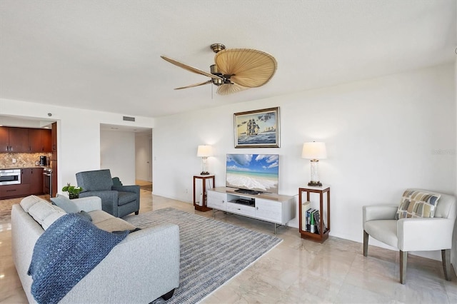 living room with ceiling fan