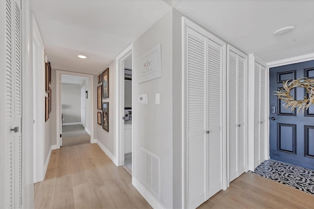 hall featuring light wood-type flooring